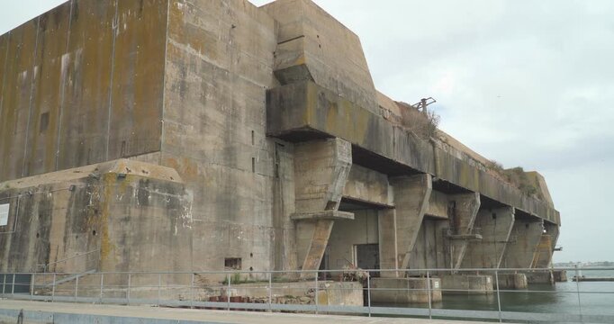The massive concrete structure of the Keroman submarine base (Block K3) in Lorient, Brittany, France.