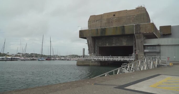 The massive concrete structure of the Keroman submarine base (Block K3) in Lorient, Brittany, France.