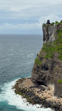 Uluwatu Temple is a sacred, 10th-century Balinese sea temple perched on a 70-meter-high cliff edge in Pecatu, Bali.	