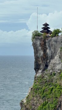 Uluwatu Temple is a sacred, 10th-century Balinese sea temple perched on a 70-meter-high cliff edge in Pecatu, Bali.