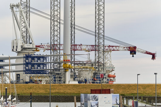 Esbjerg, Denmark - 31 July 2026: View of the offshore vessel Wind Keeper loaded with wind turbine blades, seen from the marina dike as it prepares for transport.