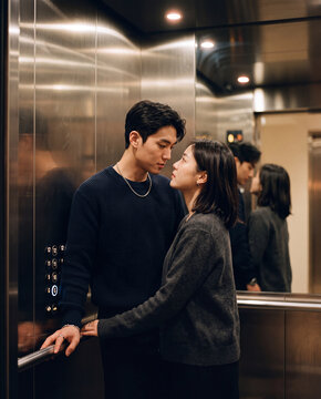 Romantic couple embracing in elevator interior for intimate portrait background and relationship scene for character storytelling