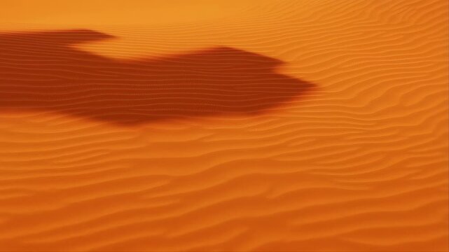 Sand Dune with Rippled Texture and Moving Shadow Across the Surface and Desert Landscape and Orange Sand and Natural Patterns