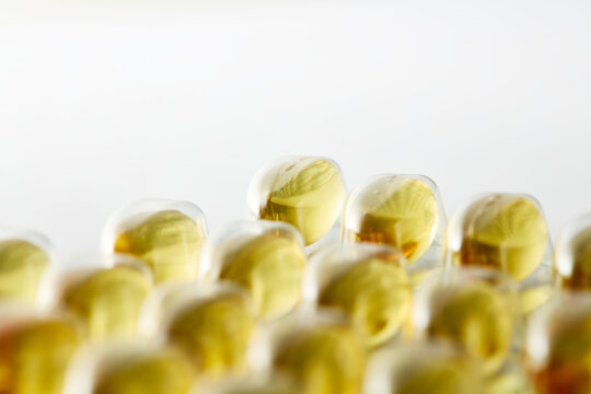 Yellow Omega 3 Softgel Capsules in Blister Pack Close Up