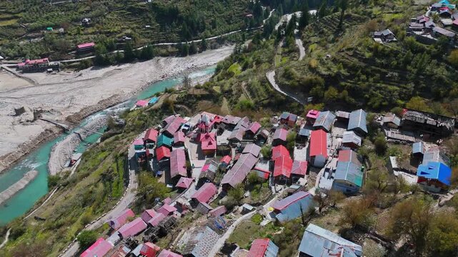 tunning Top Down Drone View of Mukhwa Ganga Temple in the Himalayan Mountains of Uttarakhand with Forested Valleys