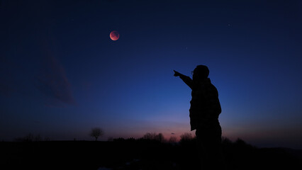 Amateur astronomer observing stars, planets, Moon eclipse and other celestial objects. © astrosystem