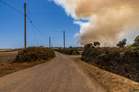 Smoke seen from a wildfire at Chapel Carn Brea near Lands End in Cornwall, during a hot dry summer