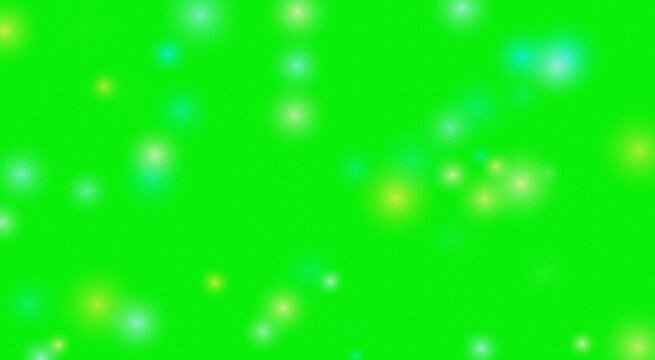 Soft glowing bokeh light orbs scattered across a solid bright green background, digital overlay effect with diffused yellow and white circular flares