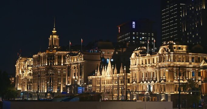 Shanghai, China. Night view Union Building and China Merchants Bank Building in Shanghai showcases classic architectural details at night. Great Northern Telegraph Building
