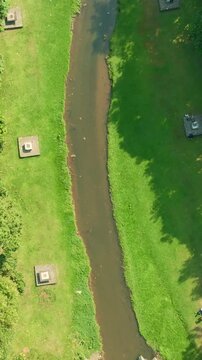 Top down aerial view of central park canal in Yogyakarta