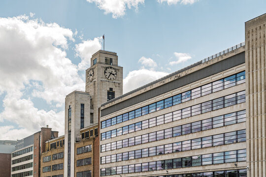 View of the former Daily Telegraph building with its iconic clock tower and stone facade in London, England, United Kingdom.