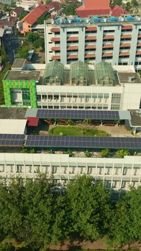 Rooftop solar panels on urban building in Yogyakarta