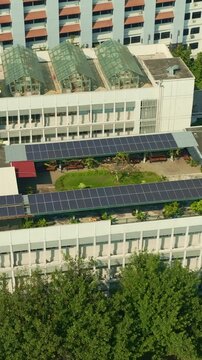 Large rooftop solar panel installation on Yogyakarta urban building