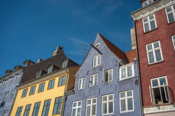 Fototapeta premium Stunning Architectural Facades Under a Clear Blue Sky