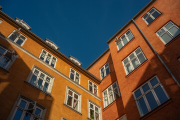 Fototapeta premium Stunning Architectural Facades Under a Clear Blue Sky