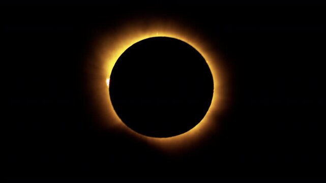 moment of totality during the 2026 solar eclipse when the moon cast a shadow over the sun 