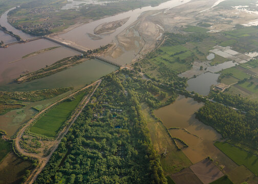 Aerial view of Rana Resort and Safari Park featuring lush greenery, winding river channels, and agricultural fields in Phool Nagar, Punjab, Pakistan.