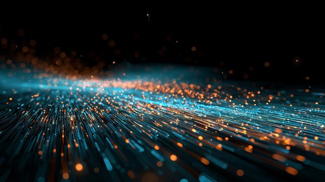 Glowing blue and orange fiber optic data cables transmitting high speed information particles through digital space with intense bokeh light