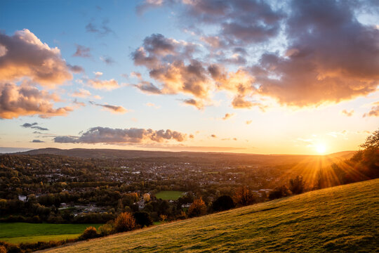 Beautiful Landscape image fo view from Box Hill in Surrey AONB during Autumn sunset