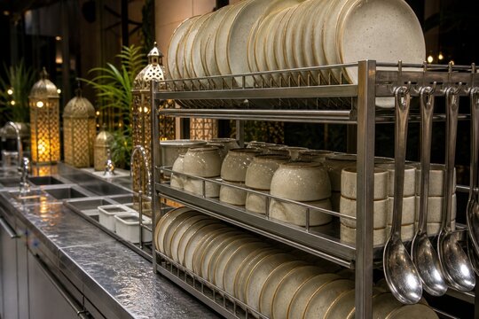 Reusable tableware drying after a community Ramadan iftar for low waste hospitality for respectful food, hospitality and community campaigns