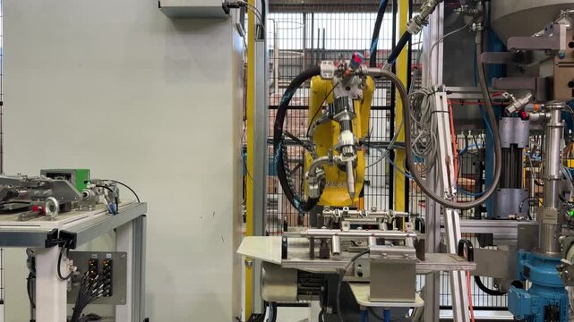 Robotic arm assembling components in a high-tech automated factory