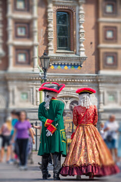 People in 18th century historical costumes at Church of the Savior on Blood with copy space
