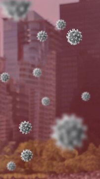 Animation of covid 19 cells floating over cityscape on pink background