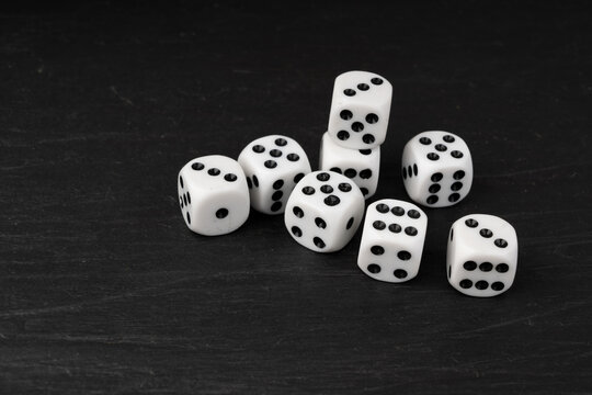 White game dice with black dots