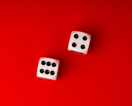 White game dice with black dots