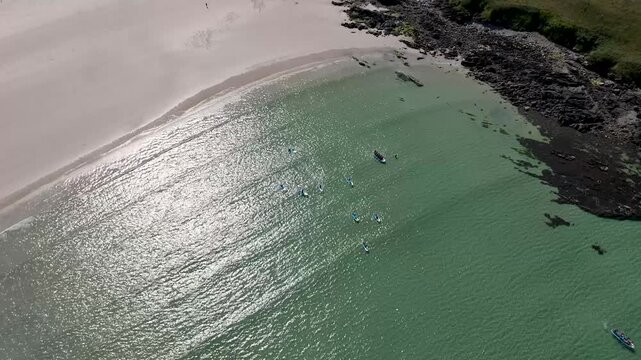 Aerial view of a Standup Paddle group at Narin Beach by Portnoo in County Donegal, Ireland