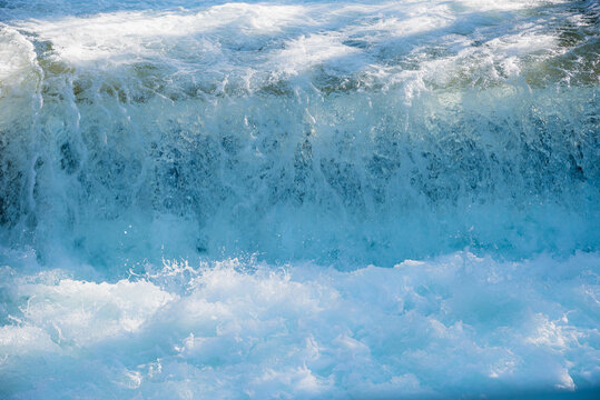 rapids in the river with bubbling water