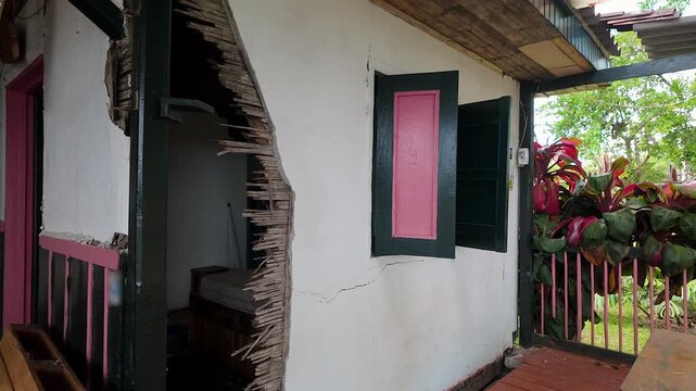 colombia earthquake house exterior wall damage collapse disaster