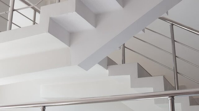 A simple yet elegant white staircase featuring a clock at the top, perfect for use in illustrations and designs
