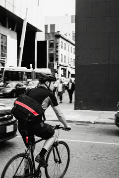Cyclist riding a bicycle on a city street