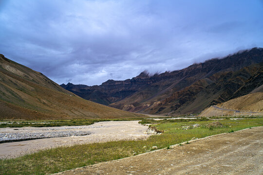 Glacial Torrent Stream Flowing Through V Shaped Mountain Valley Near Gonbo Rangjon in Zanskar, Ladakh, India. 