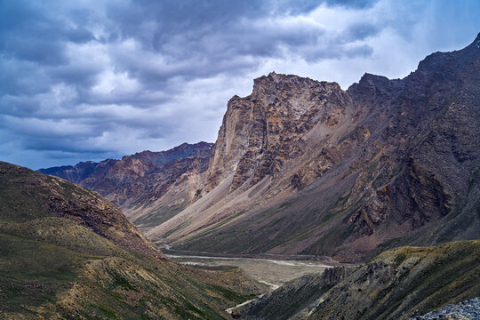 Majestic Rock Cliff of Sacred Gonbo Rangjon Mountain Under Stormy Sky in Zanskar Valley, Ladakh, India.
