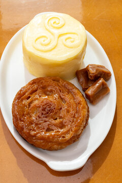 Food of Brittany, hand-made farm salted butter, Kouign-amann legendary Breton confection, caramel with butter, authentic Breton food with centuries-old tradition