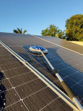 Maintenance cleaning of solar panel roof