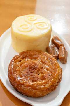 Food of Brittany, hand-made farm salted butter, Kouign-amann legendary Breton confection, caramel with butter, authentic Breton food with centuries-old tradition