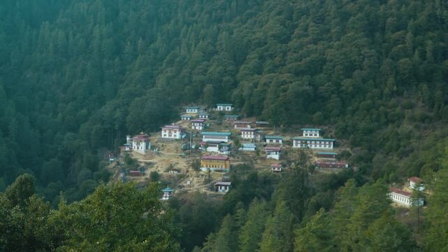 Slow Zoom In on Dodedrak Monastery in the Forested Mountains of Thimphu, Bhutan