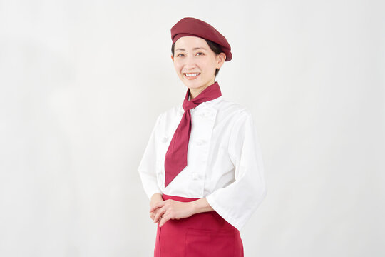 笑顔のパティシエ女性のポートレート