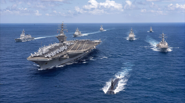 Aircraft carrier leading naval strike group across deep blue ocean. Fleet of warships and submarine participating in maritime exercise.