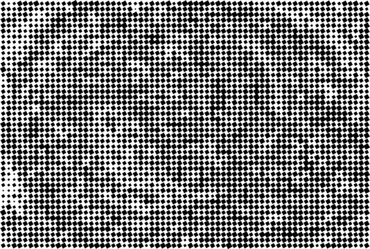 Close-up geometric pattern of black and white dots on fabric