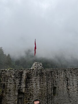 Turkish flag.Turkish Flag Flying Above Zilkale Castle in Misty Rize, Turkey