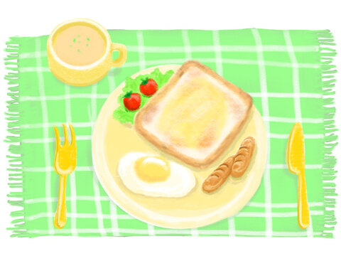 緑のランチョンマットの上にトーストと目玉焼きとウインナー・サラダ・スープの朝ごはんが乗ったイラスト