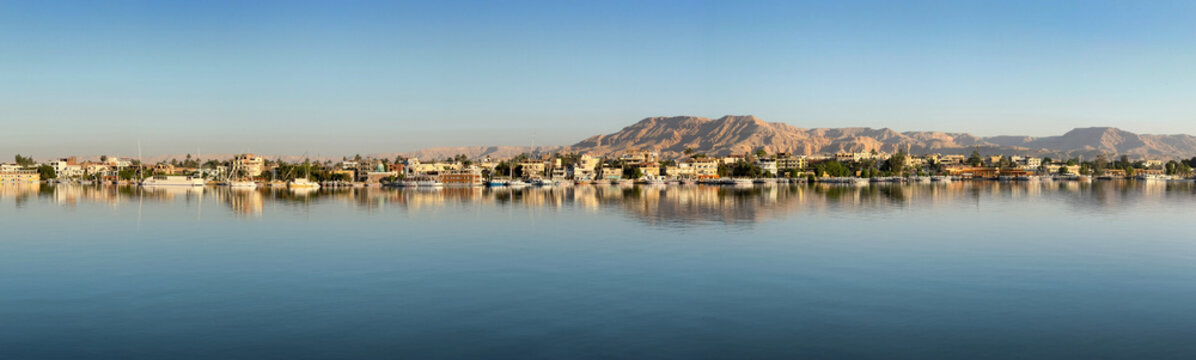Panoramic view of the Nile river with Feluccas at morning in Aswan, Egypt