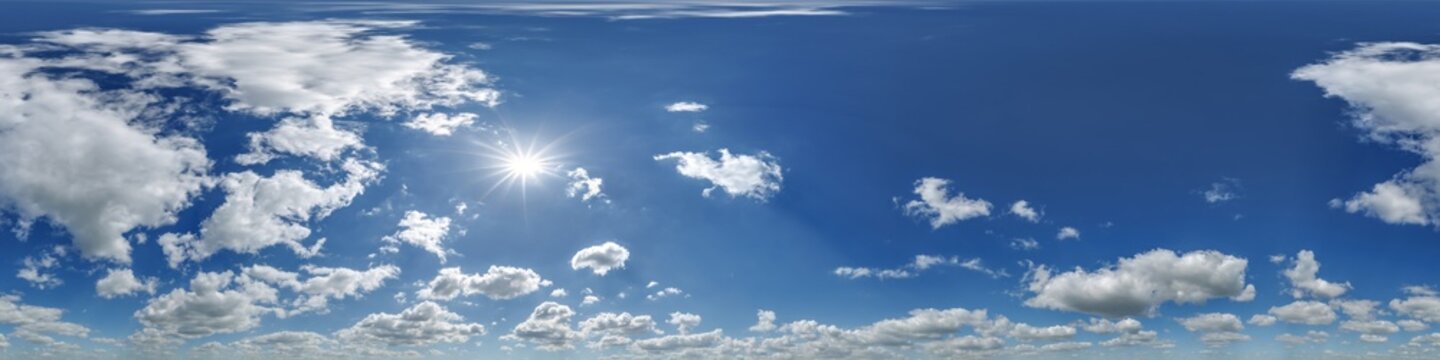 360 hdri blue sky with beautiful clouds with halo like a seamless panorama view with zenith for use in 3d graphics or game development as sky dome or edit drone shot