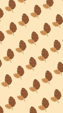 Seamless autumn pattern of paired brown leaves on warm beige background animation for fall season wallpaper and Thanksgiving backdrop design.