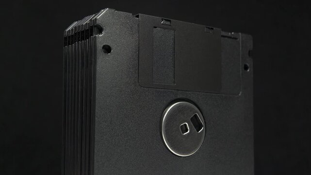 Black floppy diskettes. Floppy disk, diskette, or floppy diskette - type of disk storage made from a thin, flexible disk coated with magnetic storage medium