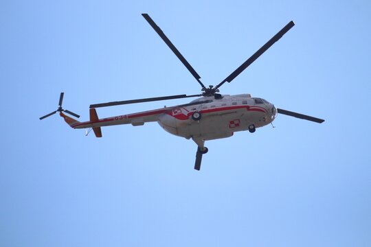 KATOWICE, POLAND - AUGUST 15, 2019: Air show for Armed Forces Day in Katowice, Poland. Official government transportation Mi-8 helicopter flying over Katowice.